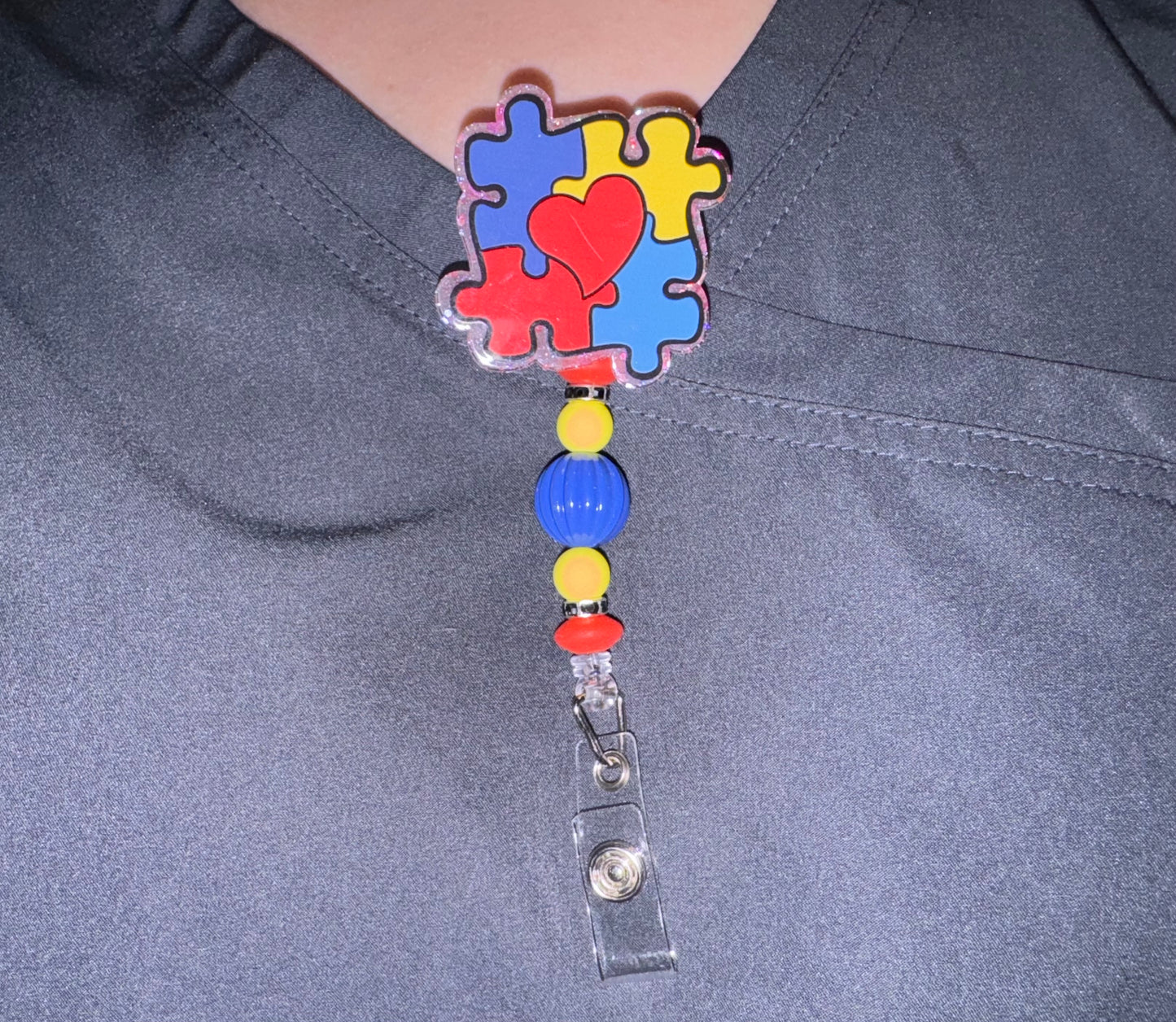 Autism Puzzle Piece Badge Reel