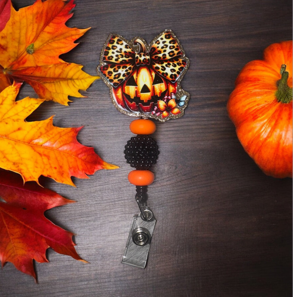 Pumpkin Leopard Bow Badge Reel