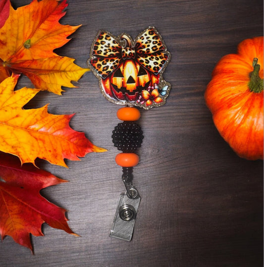 Pumpkin Leopard Bow Badge Reel